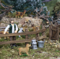Hirte stehend am Zaun
