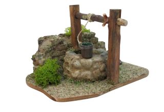 Brunnen / Ziehbrunnen mit Mauer und Eimer