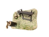 Holzplatz mit Beil und Sägebock