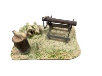 Holzplatz mit Beil und Sägebock